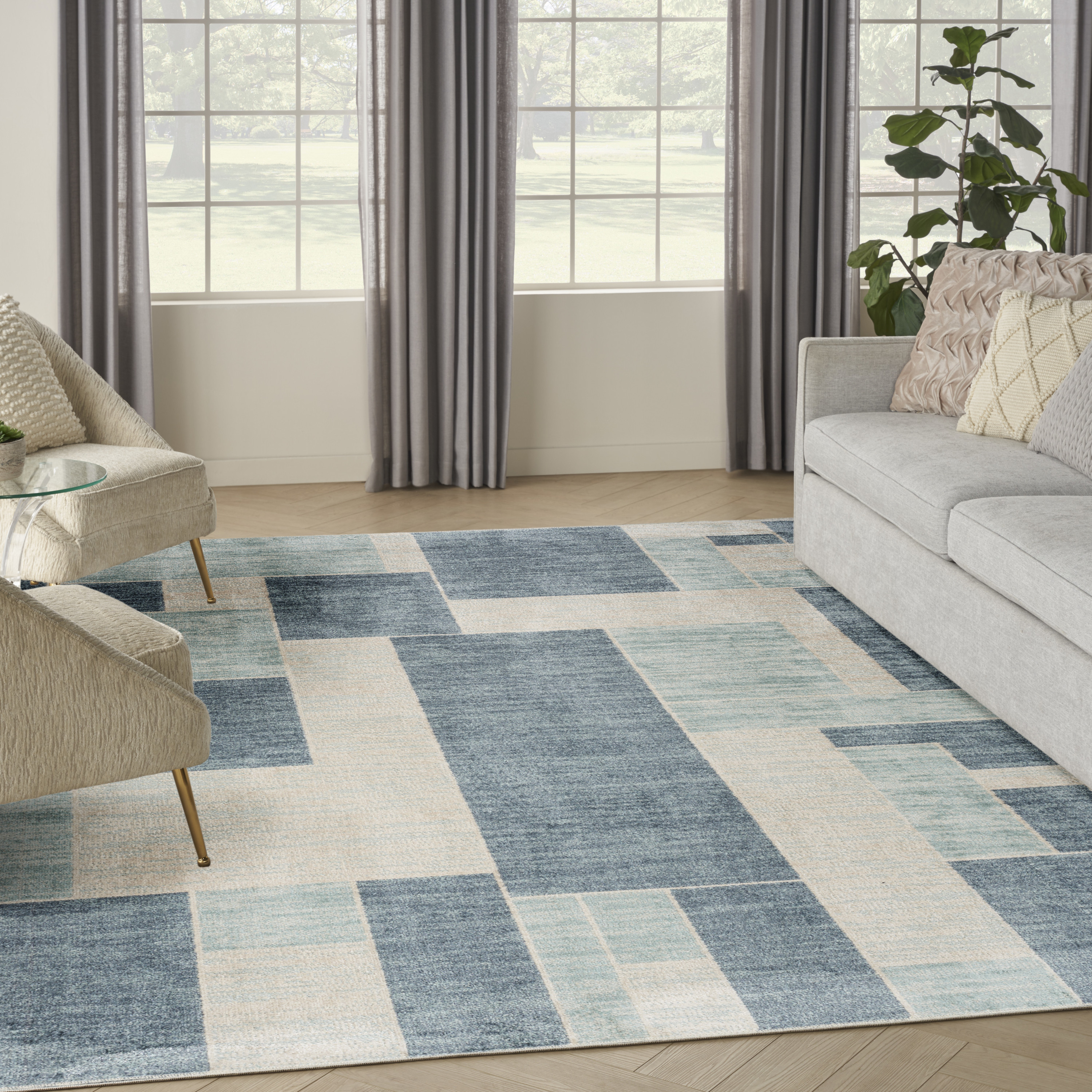 Nourison Astra Machine Washable 6'7" x 9' Blue Ivory Modern Indoor Rug