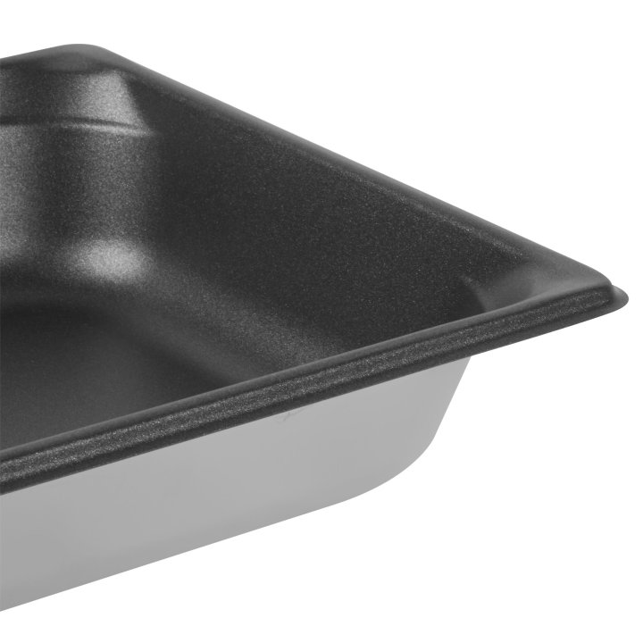 Half-size 2 ½-inch-deep Super Pan 3® stainless steel steam table pan with Steel Coat x3™ nonstick coating