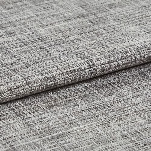 Woven grey curtain fabric folded into overlapping horizontal layers, showing coarse, irregular weave; tight close-up with neutral lighting highlighting texture and subtle tonal variation.