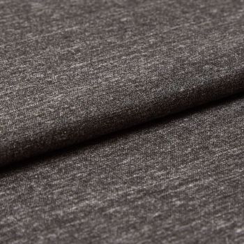 Dark gray woven upholstery fabric, folded with an overlapping edge, showing subtle metallic sheen and fine horizontal texture; close-up view under soft studio lighting against a neutral backdrop.