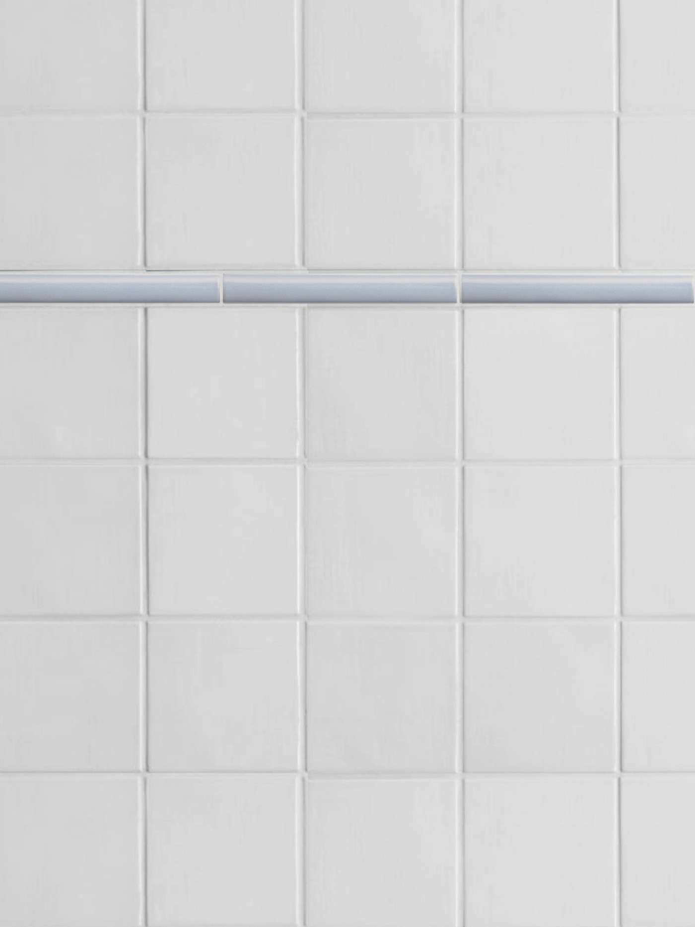 an image of a white tiled wall with a blue stripe.