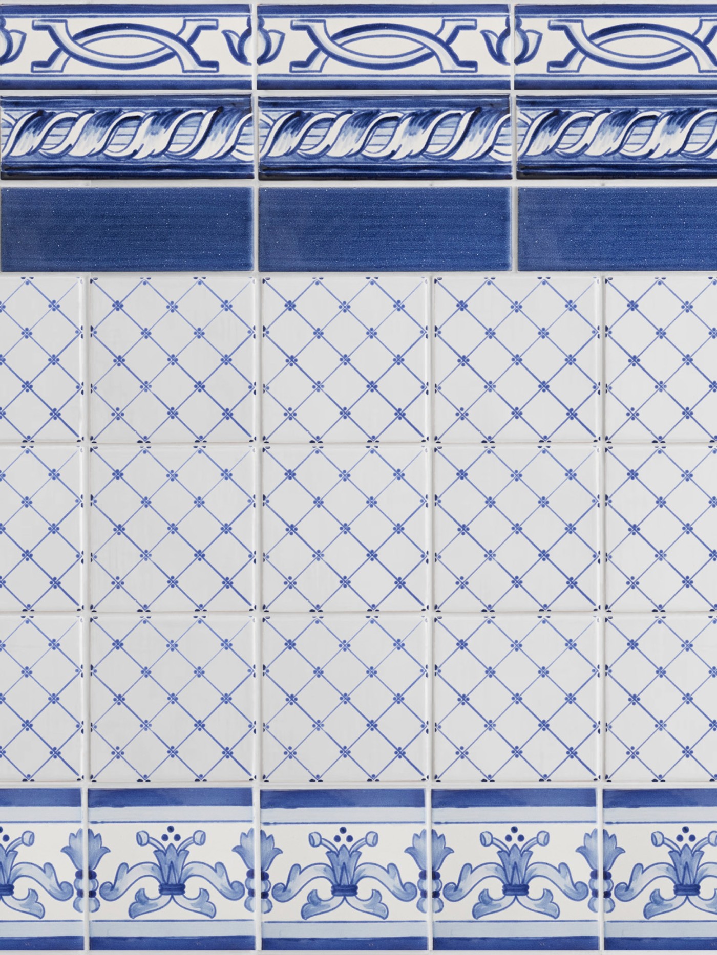 a blue and white tiled wall with an ornate design.