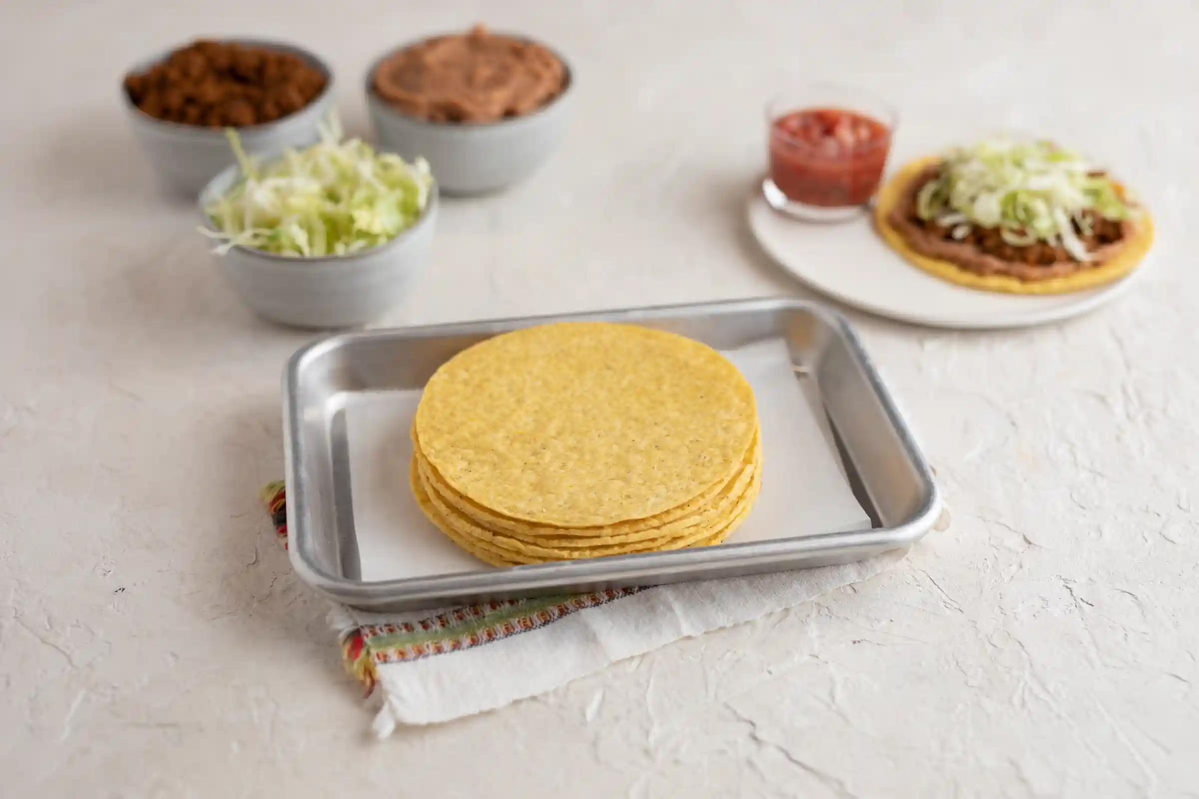 Mexican Original® 5.5" 100% Whole Grain Corn Tostada Shells, 200/1.20 oz. https://images.salsify.com/image/upload/s---Xc8J3VK--/q_25/y06he0olvwtwpmfvjyjj.webp