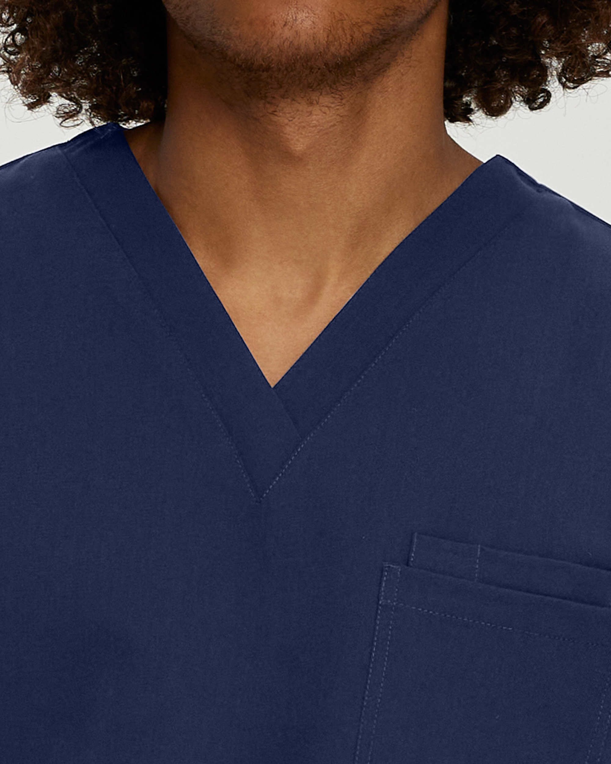 White Cross V-Tess 2206 Men&#8216;s Fade Resistant 2 Pocket Tuckable Scrub Top WSL-White Cross