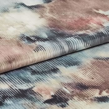 Folded ribbed velvet fabric with watercolor-like washes of blue, pink, beige and black â€” layered to reveal horizontal ribs and soft pile â€” close-up on a softly lit neutral surface.