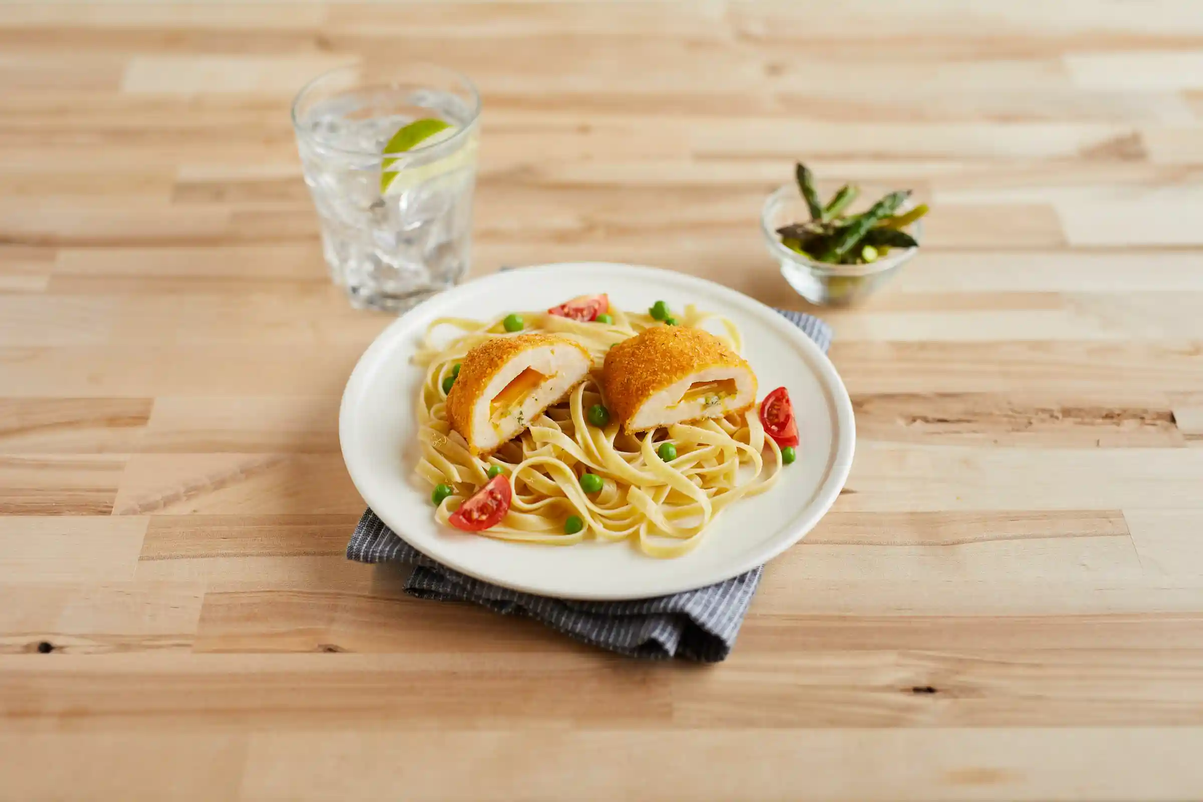 Barber Foods® Uncooked Breaded Chicken Kiev Boneless Stuffed Chicken Breasts 4 oz. https://images.salsify.com/image/upload/s--8h0yfmcA--/q_25/h4m0dmuvlnn3yt2u2asr.webp