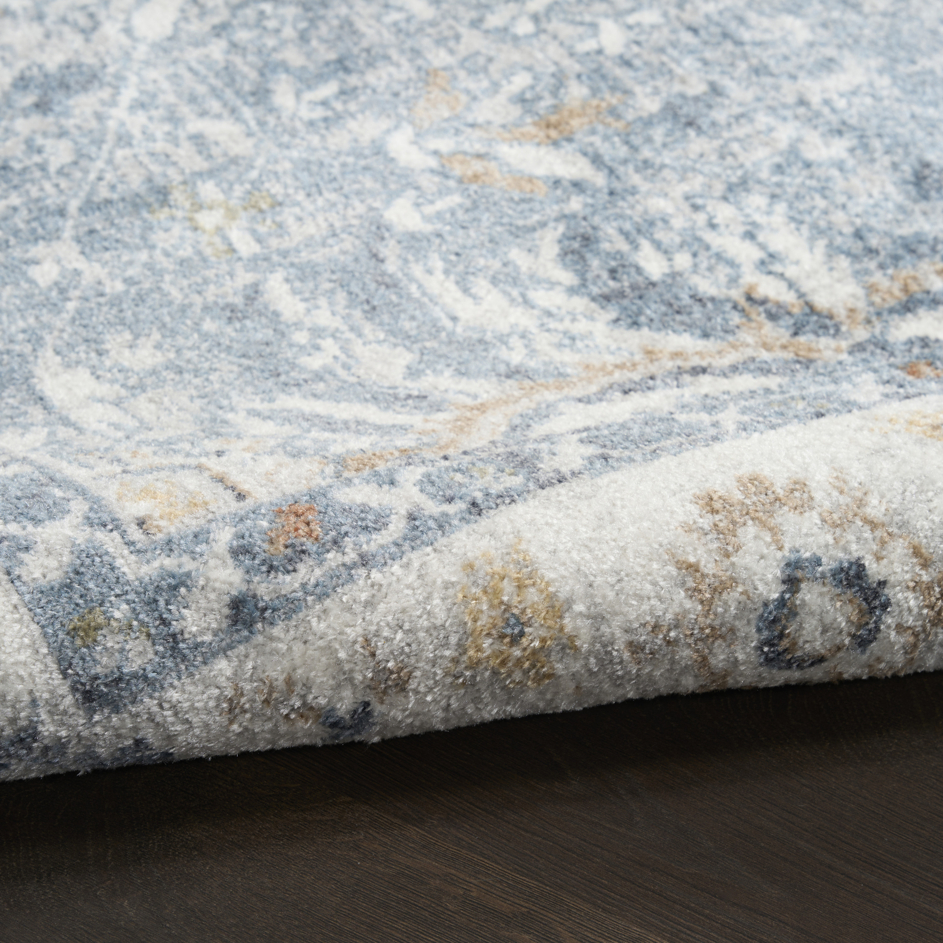 Nourison Astra Machine Washable 6'7" x 9' Blue Vintage Indoor Rug