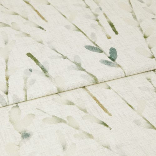 Light, folded curtain fabric with watercolor green leaf sprigs, draping in a horizontal fold; filtering soft light, photographed close-up to show linen texture and subtle botanical print.