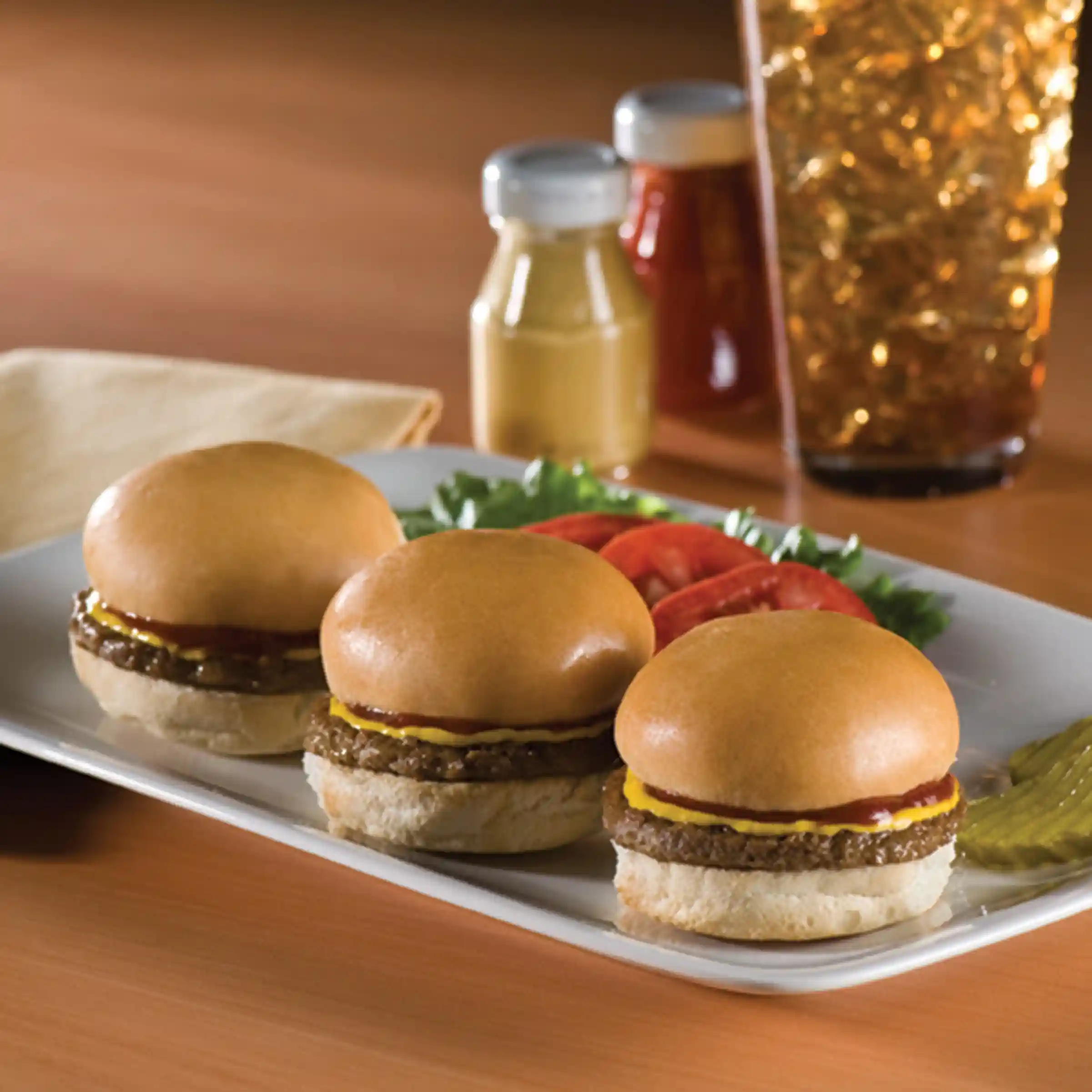 Tenderbroil® Flame Grilled Mini Beef Patties with Buns, 2 oz. https://images.salsify.com/image/upload/s--P9sRNPtm--/q_25/qcluncmoudsb4n5cokmx.webp