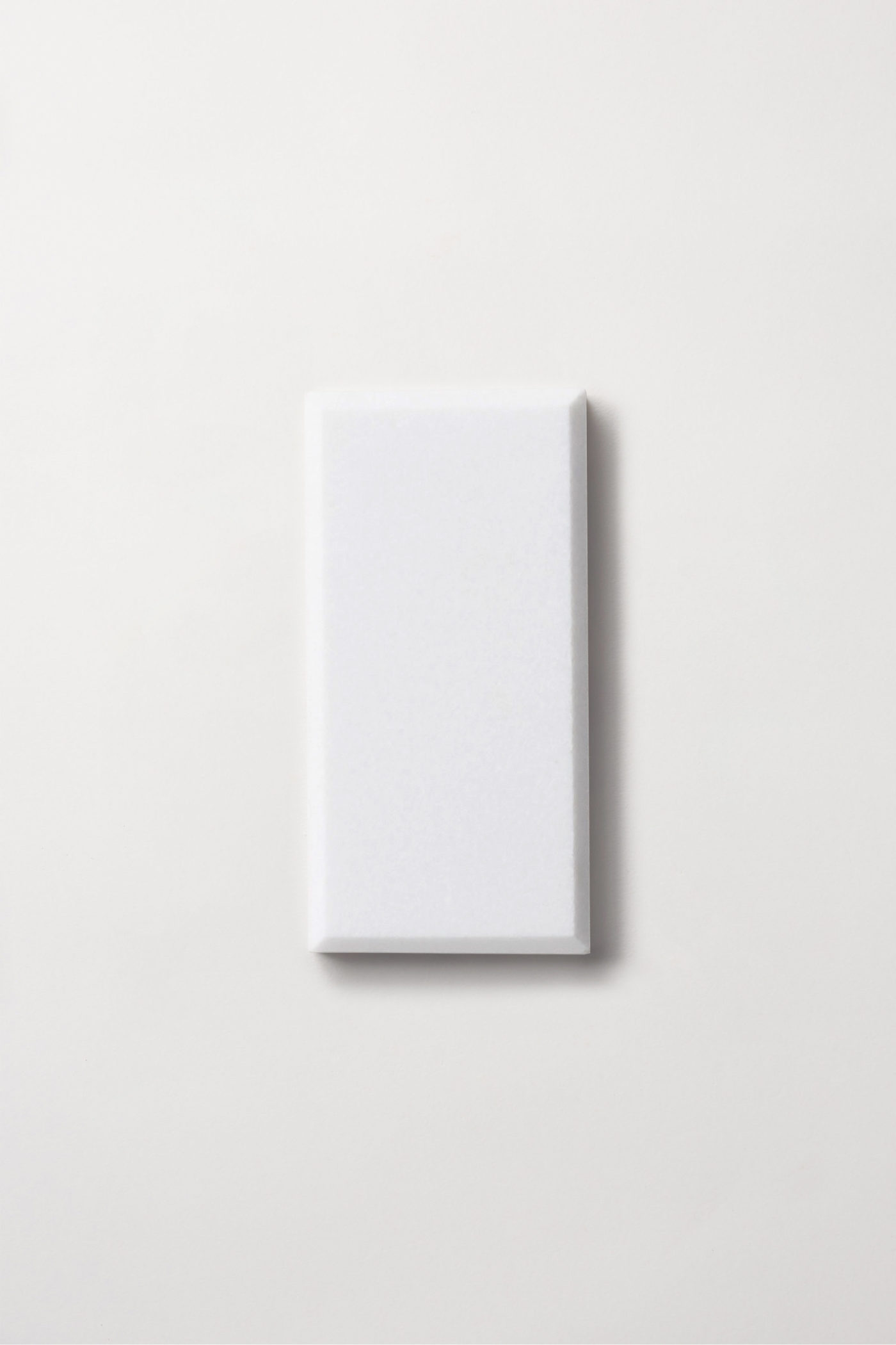 a white rectangle on a white surface.