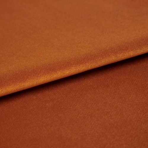 Copper-orange satin fabric, folded with visible edge, reflecting light â€” close-up studio shot showing soft sheen, fine texture, and warm even lighting.
