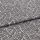 Folded patterned fabric: gray-and-white geometric print of short parallel stripes forming irregular polygons, folded across the middle. Close-up on flat surface with even studio lighting.