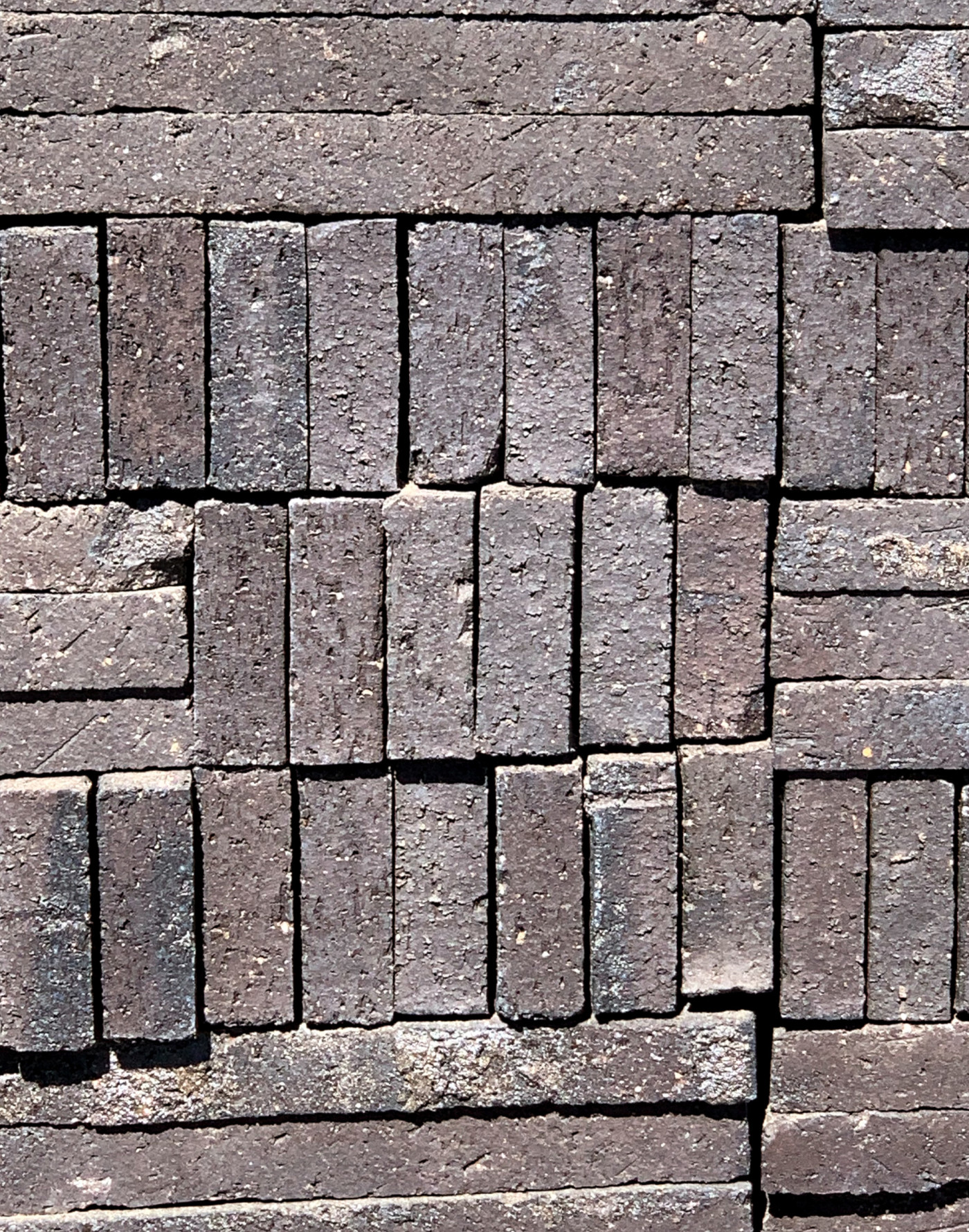 a close up view of a brick surface.