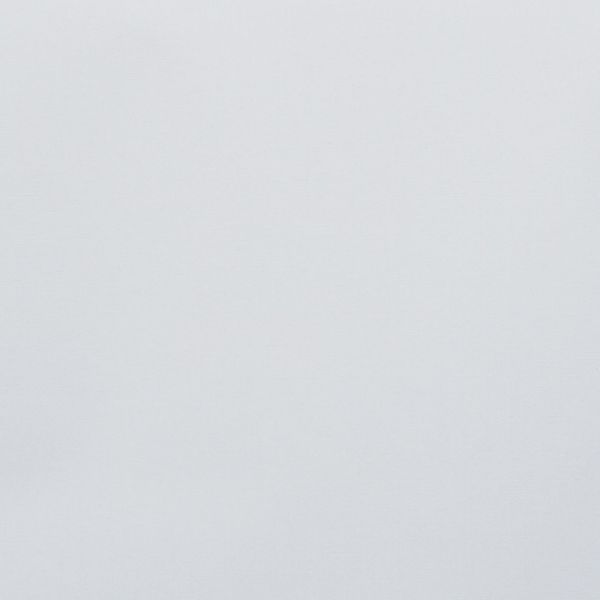 Plain pale-gray wall occupying the frame, unadorned and uniformly lit, showing subtle fabric-like texture; minimal context with soft diffuse light and no visible furnishings or details.