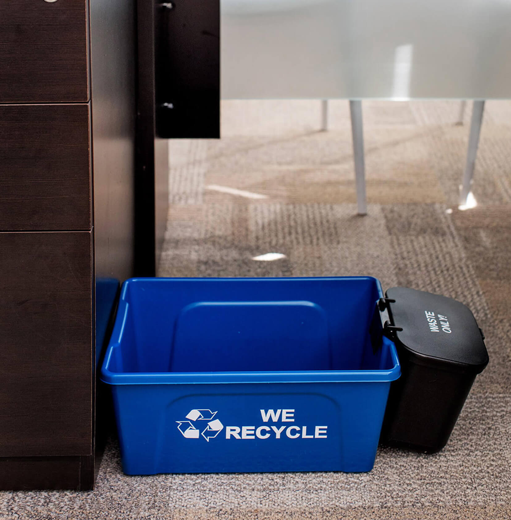small under desk recycling bin with a hanging trash bin on the floor under an office desk
