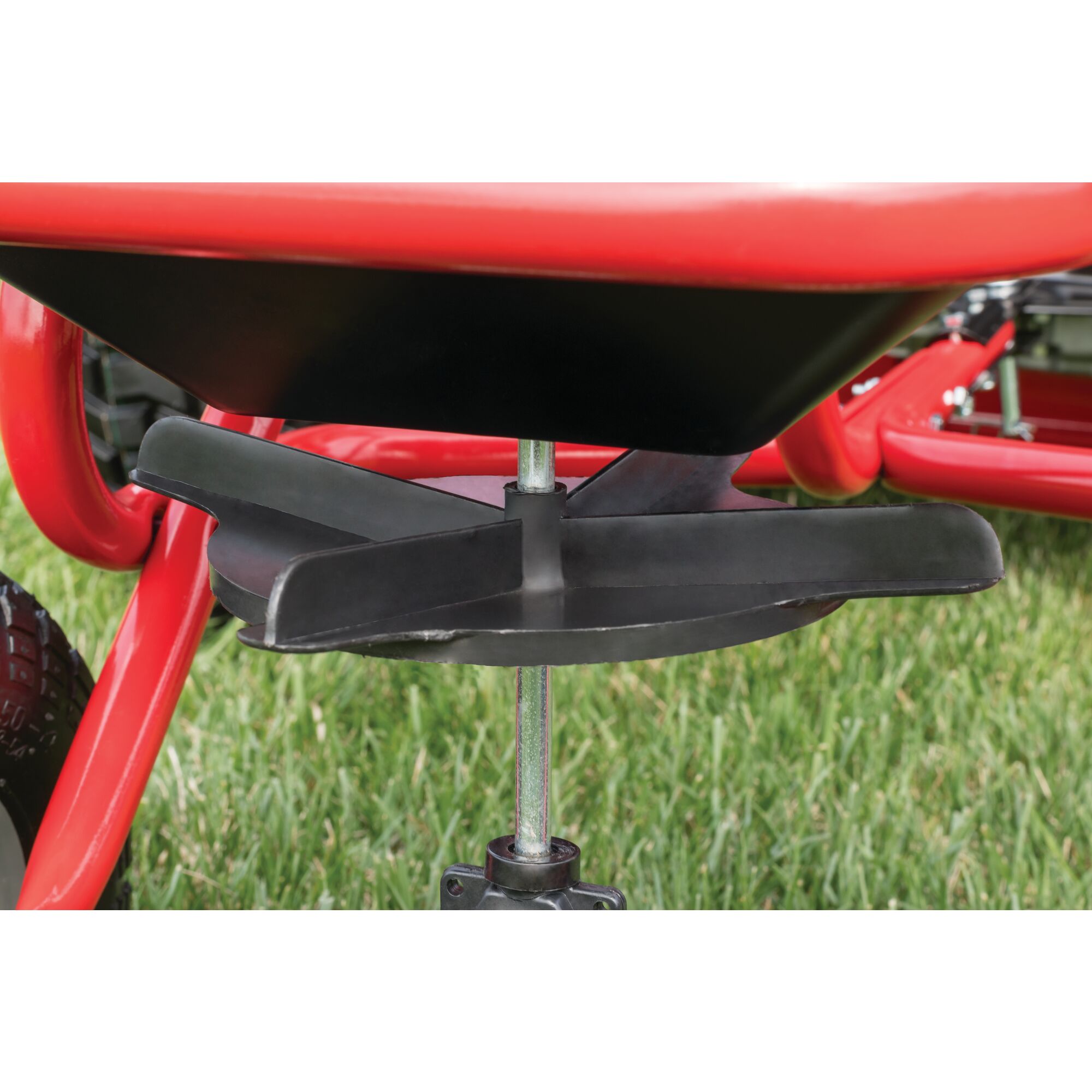 Non slip traction feature of 85 pounds tow broadcast spreader.