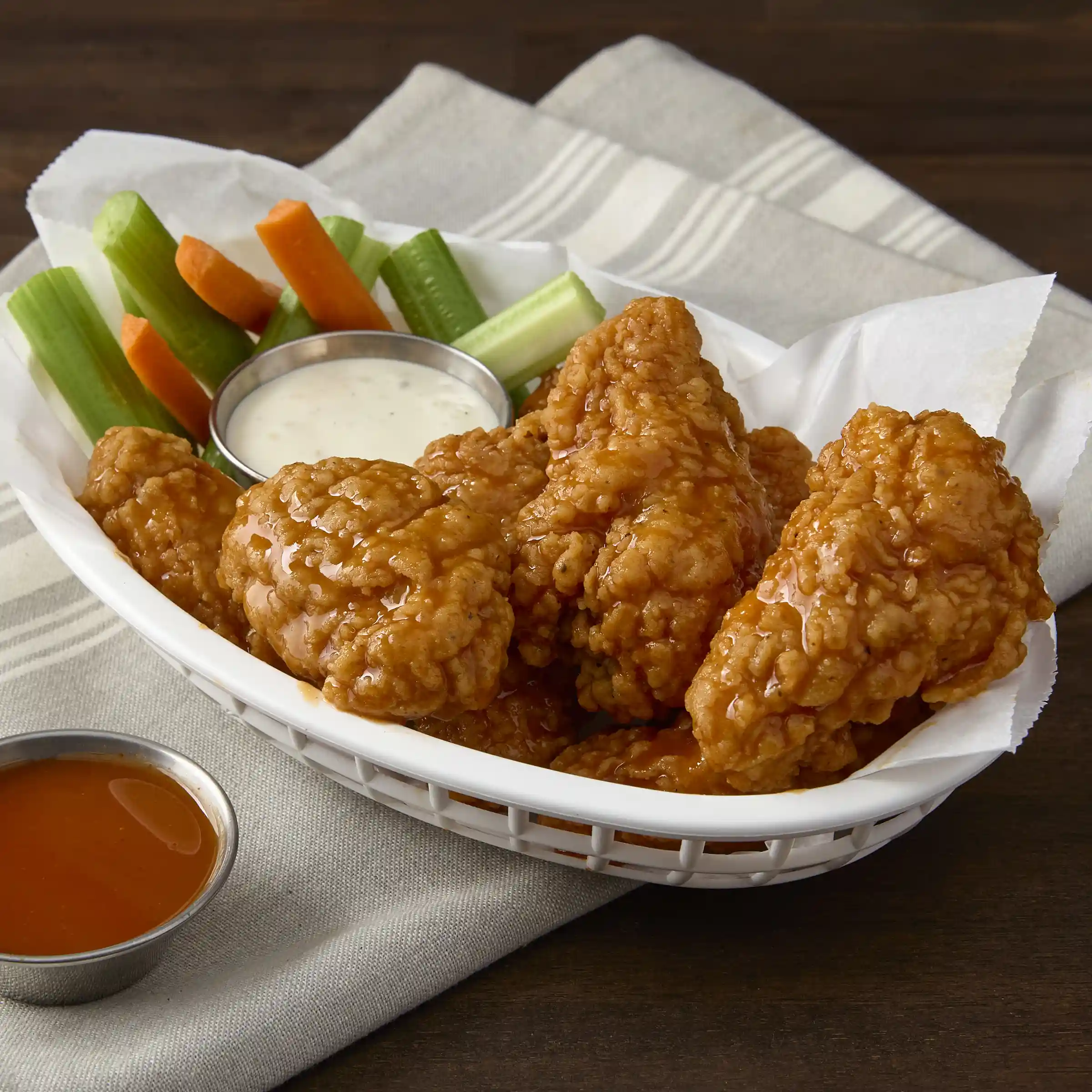 Tyson® Uncooked Breaded Hot & Spicy Bone-In Chicken Wing Sections, Small_image_1