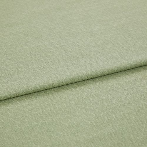 Pale green woven fabric folded once, showing a horizontal overlap and subtle textured weave; lying flat in soft, even studio lighting with a neutral background.