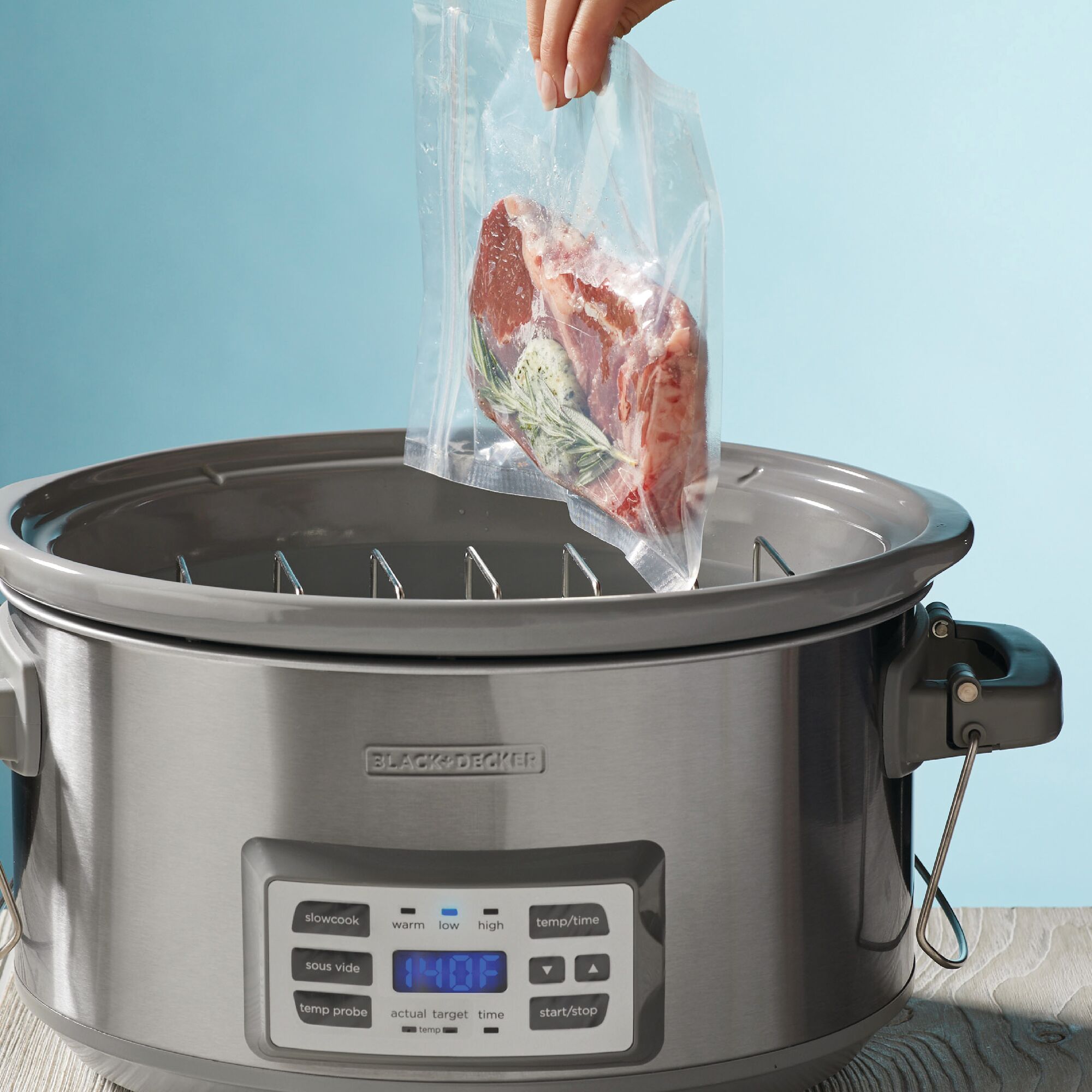 7 Quart Digital Slow Cooker with Temperature Probe + Precision Sous Vide being used to sous vide meat.