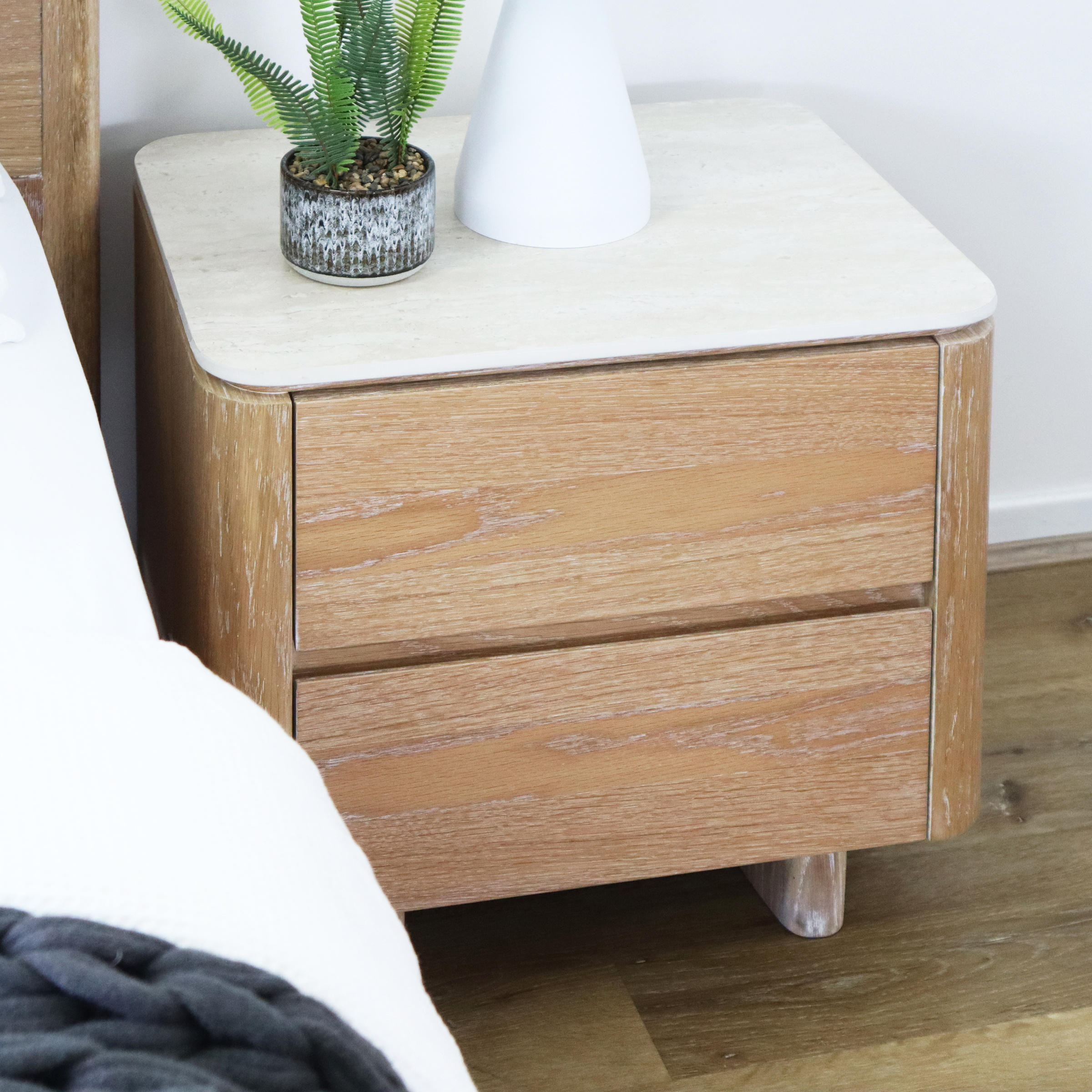 Lifestyle image of the  Azure Bedside Table (2 Drawer), Natural from Forty Winks