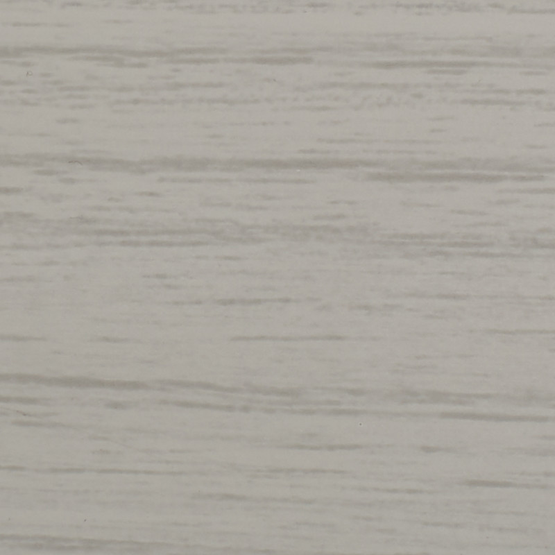 Light gray wood-grain panel with subtle horizontal streaks; lying flat and static, showing fine texture; close-up view of an evenly lit interior surface resembling laminate wall or tabletop.