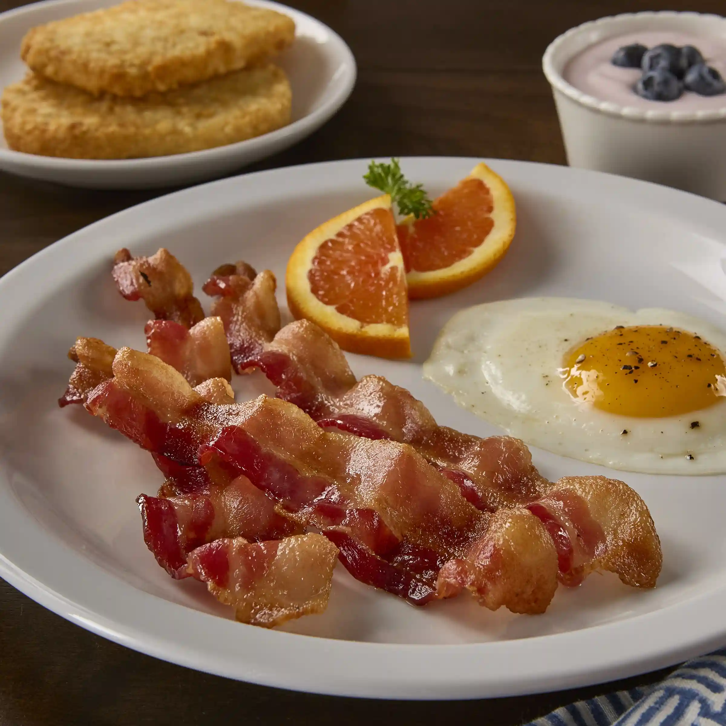 Wright® Brand Naturally Applewood Smoked Regular Sliced Flat-Pack® Bacon, 14-18 Slices per Pound https://images.salsify.com/image/upload/s--nt10w0hp--/q_25/8b41edbcb086df49d59da7cbd831125f7a61371c.webp