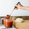 1-ounce heavy-duty stainless steel ladle with black Kool-Touch® handle