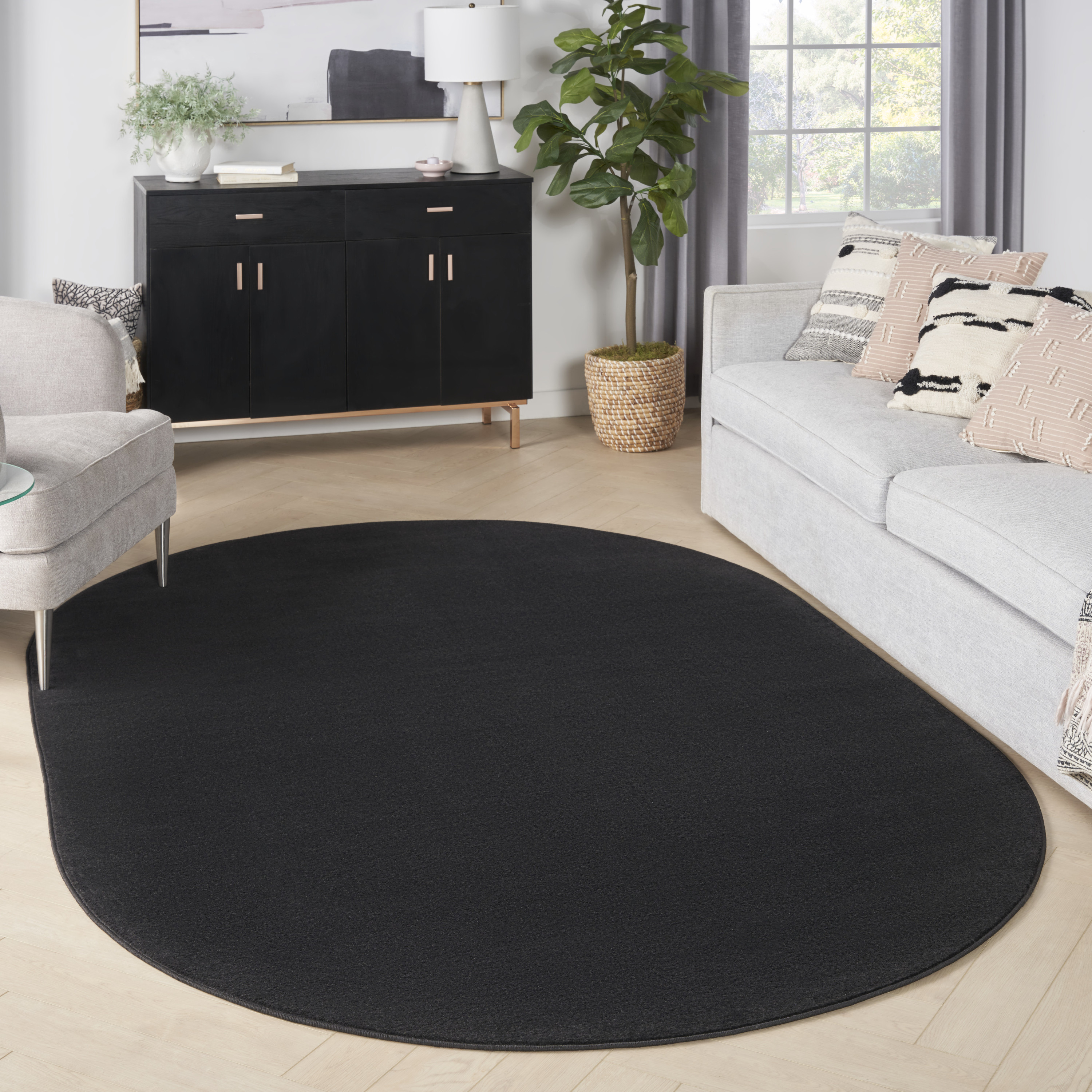 Nourison Nourison Essentials 6' x 9' Oval Black Outdoor Rug