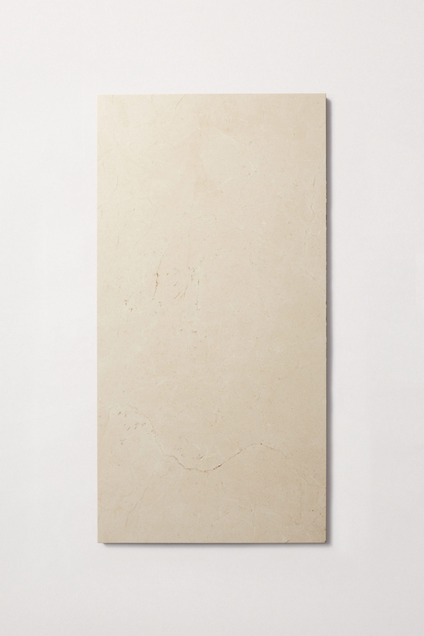 a rectangle shaped cream colored limestone tile.