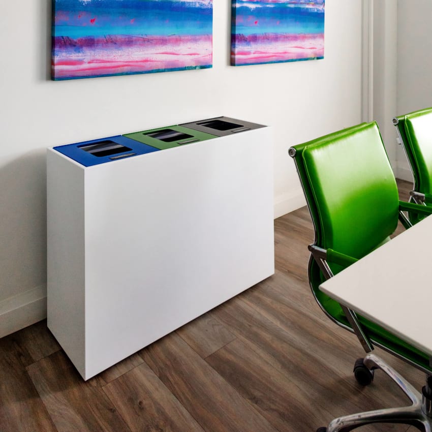 triple stream waste organics and recycling station with white powder coated body and colored lids in a corporate office