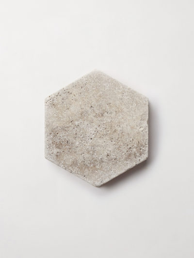 a hexagonal stone tile on a white background.