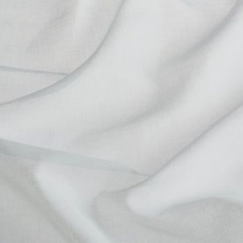 Sheer white curtain fabric, layered and draped in soft folds, gently filtering diffuse daylight; close-up interior window treatment showing subtle linen texture and delicate translucence.