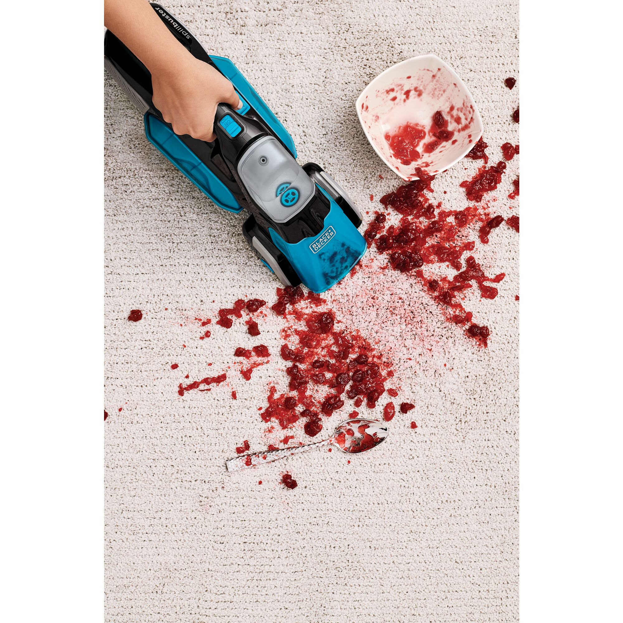 Spillbuster Cordless Spill and Spot Cleaner with Powered Scrub Brush being used to clean mess on a carpet.