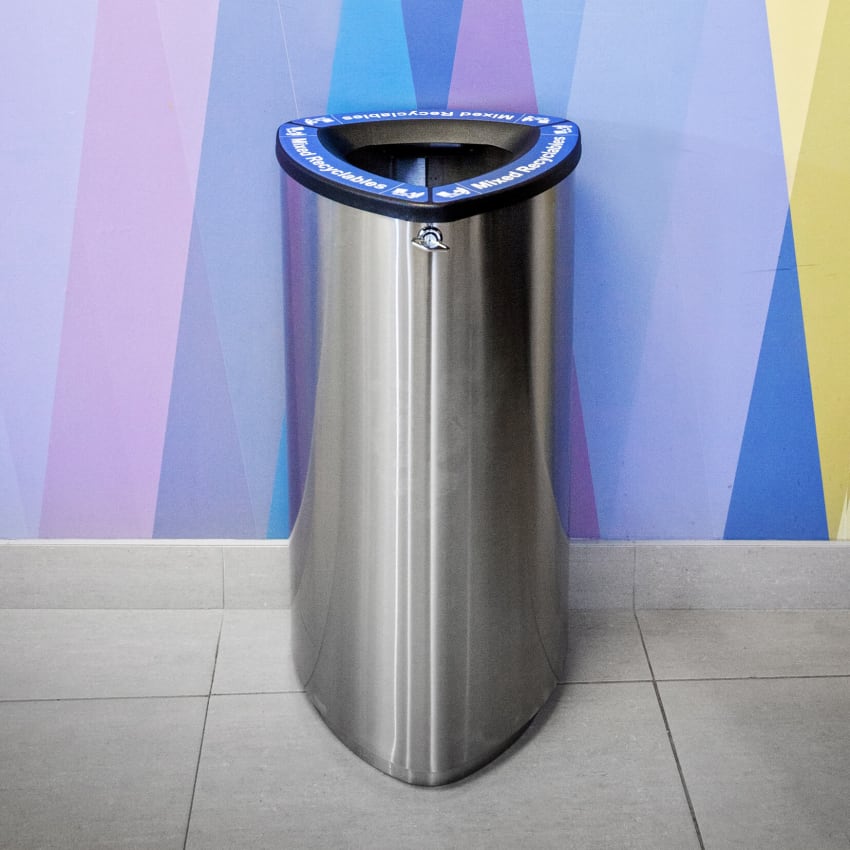 single mixed recyclables stainless steel bin in a shopping plaza