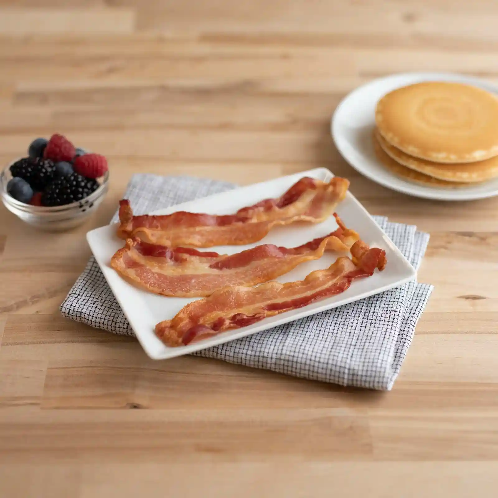 Wright® Brand Naturally Applewood Smoked Thick Sliced Bacon, Flat-Pack®, 15 Lbs, 10-14 Slices Per Pound, Gas Flushed https://images.salsify.com/image/upload/s--RkZleE6n--/q_25/lq0enyikmodqdkzax0j6.webp