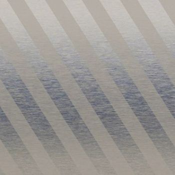 Diagonal-striped fabric window blind across the frame, alternating opaque beige and semi-translucent gray bands; filtering daylight and casting muted banded shadows; softly lit interior with a subtle textured surface visible behind.