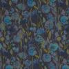 Floral fabric with watercolor-style blue and teal blossoms and slender green stems; pattern covers a dark charcoal surface, resembling wallpaper or curtain in soft, muted lighting.