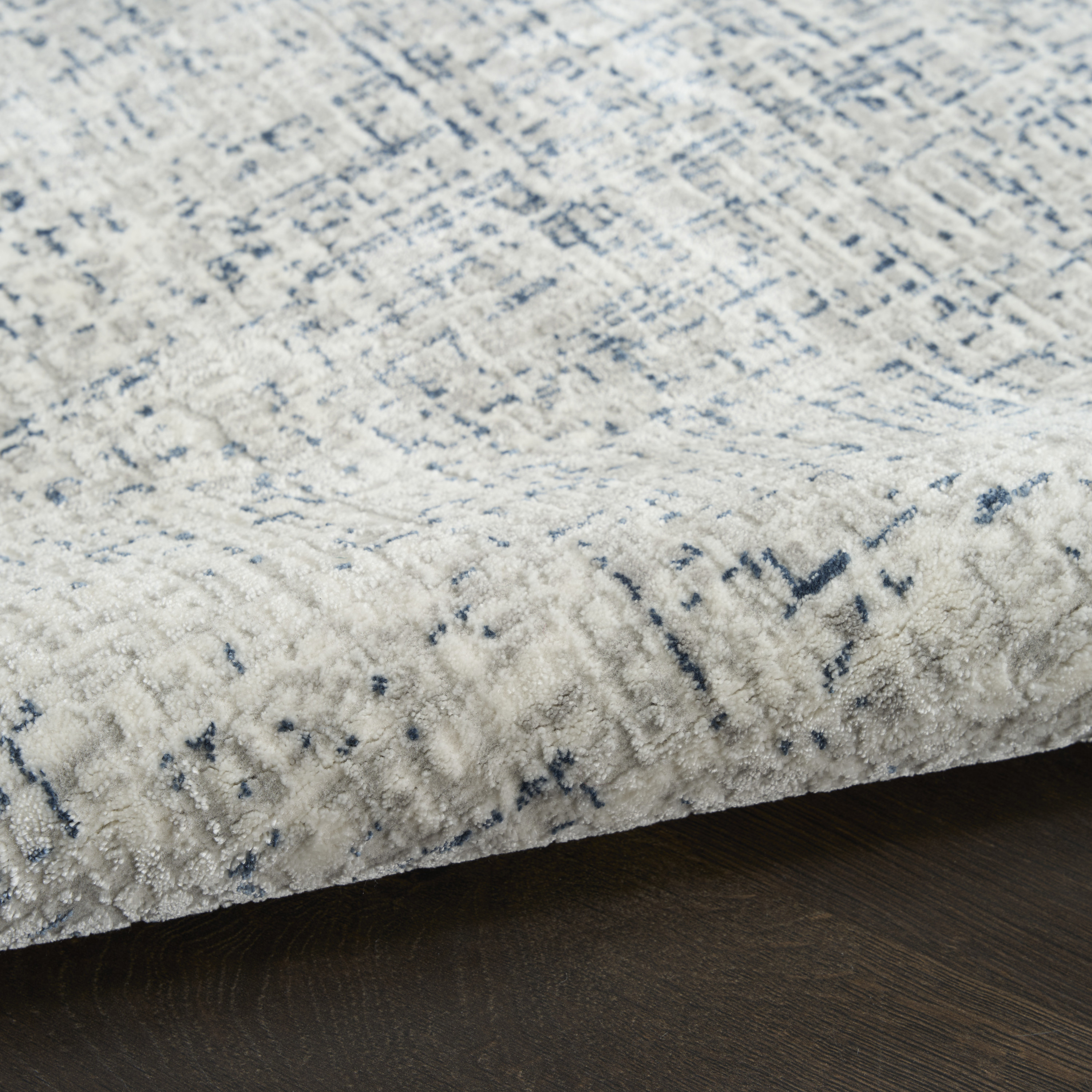 DKNY Grand Street 6' x 9' Ivory Blue Modern Indoor Rug