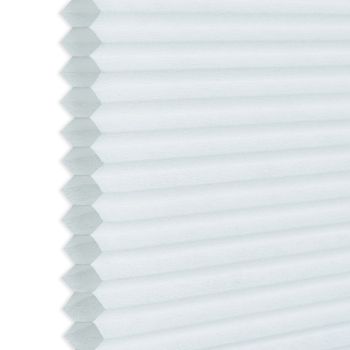 White honeycomb (cellular) blind, hexagonal pleats visible along the left edge; closed and diffusing light; photographed close-up against a neutral background, showing even soft daylight and subtle texture.