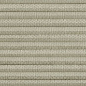 Beige pleated cellular fabric blind, horizontal folded slats with woven texture, fully closed and blocking light; close-up view with soft, even lighting, no visible window or room.