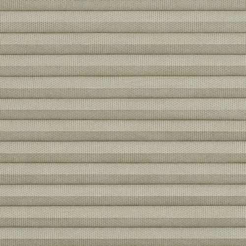 Beige pleated cellular fabric blind, horizontal folded slats with woven texture, fully closed and blocking light; close-up view with soft, even lighting, no visible window or room.