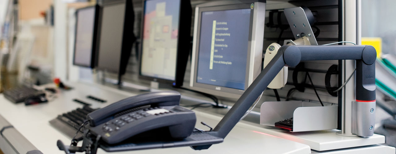 Design a space-efficient workstation that displays information clearly and comfortably.