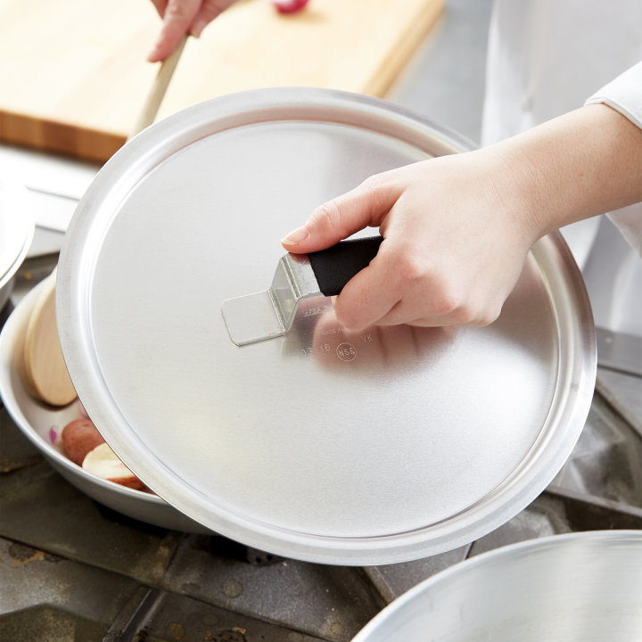 10 ¾-inch Wear-Ever® domed aluminum cover with satin finish and dipped handle