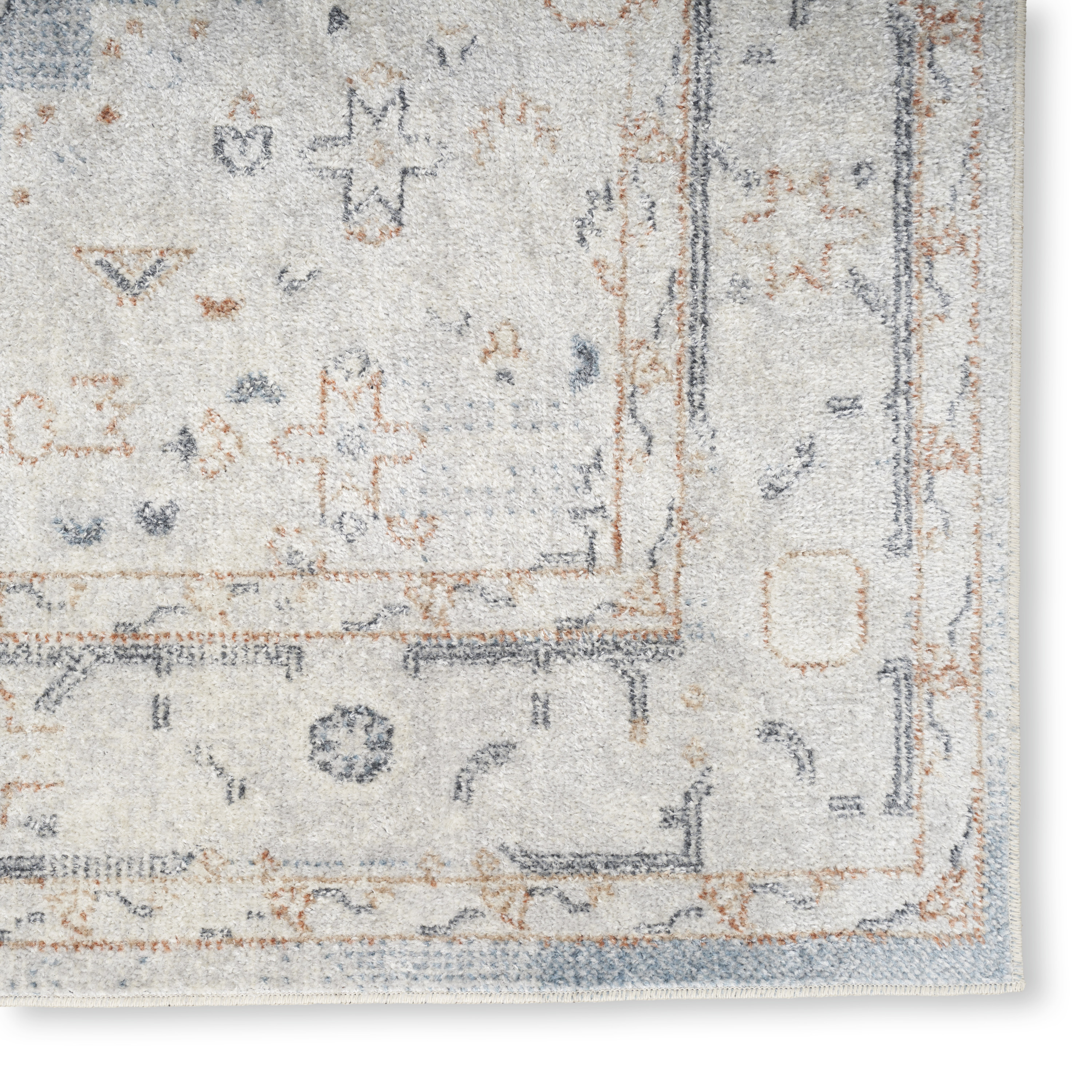 Nourison Astra Machine Washable 6'7" x 9' Light Blue Vintage Indoor Rug