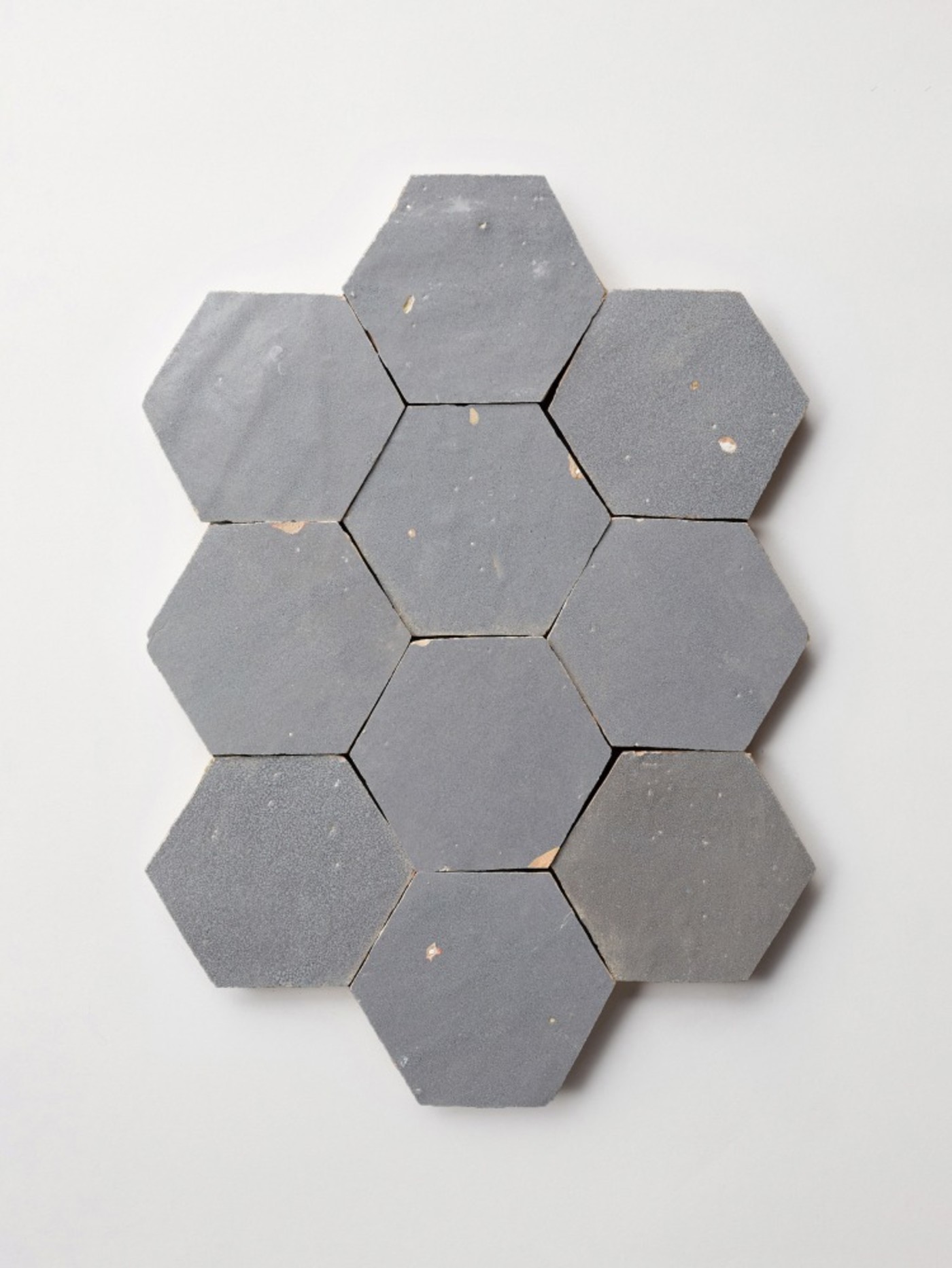 grey hexagon tiles on a white background.