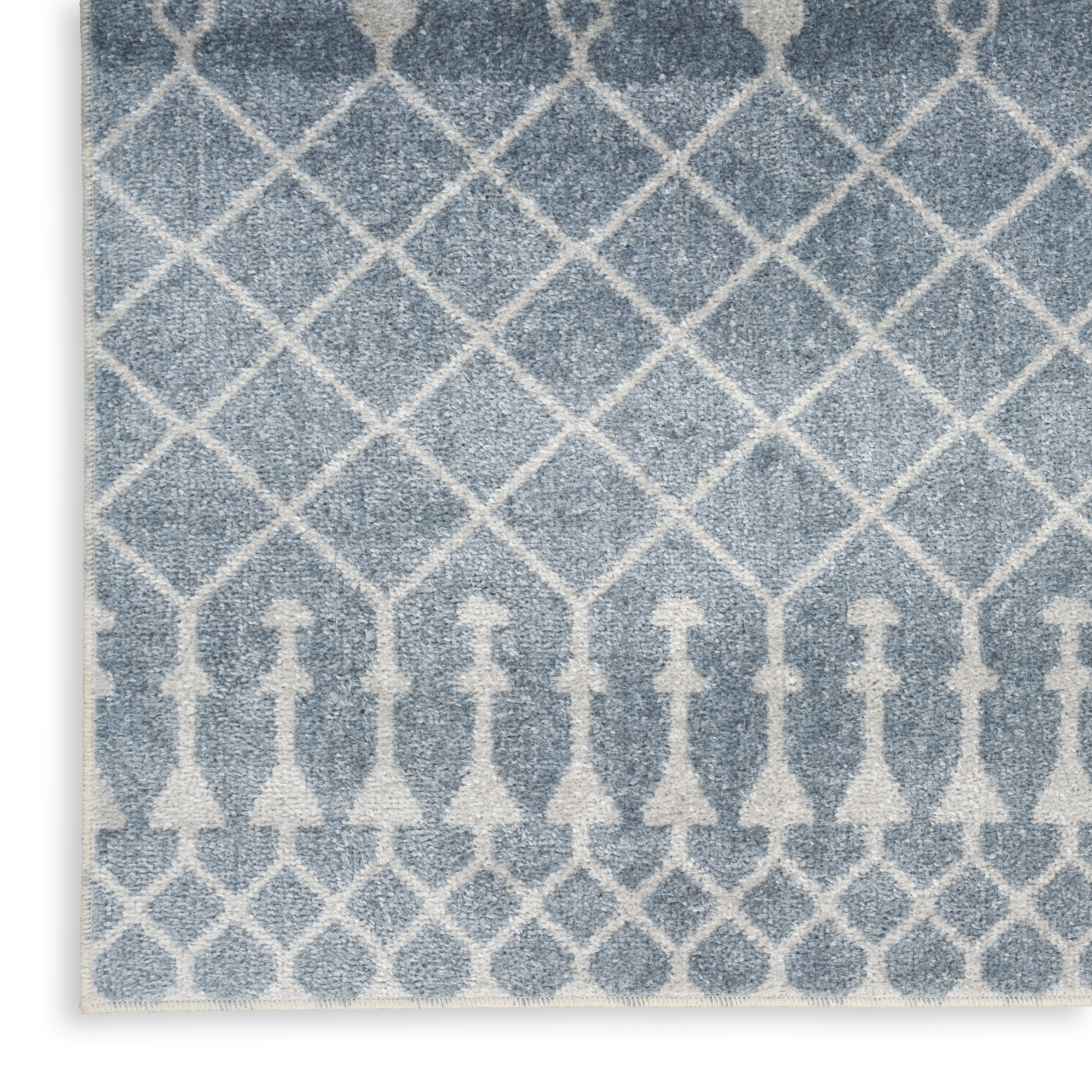 Nourison Astra Machine Washable 5'3" x 7' Blue Bohemian Indoor Rug