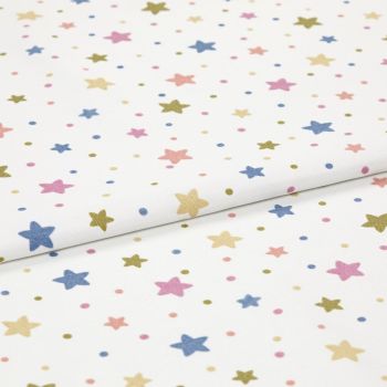 White cotton fabric with pastel star-and-dot print, folded and lying flat; small five-point stars and dots in blue, pink, yellow, olive; studio close-up, soft even lighting.