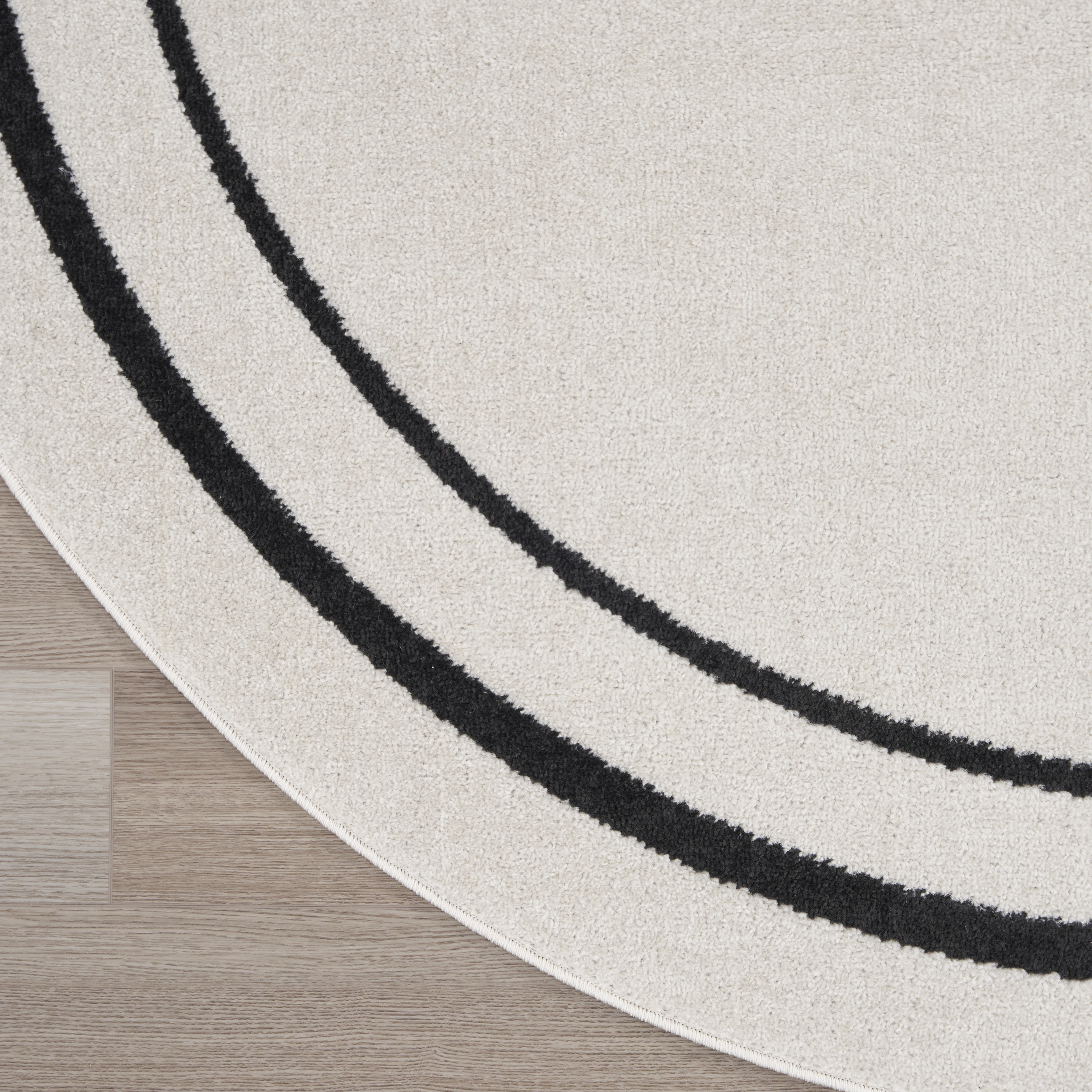 Nourison Nourison Essentials 8' x Round Ivory Black Contemporary Rug