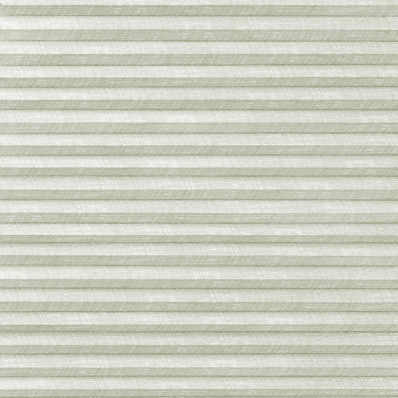 Horizontal pleated cellular blinds (pale sage, textured), closed and filtering diffuse daylight, covering a window in a softly lit interior, showing uniform horizontal folds and a subtle woven pattern.