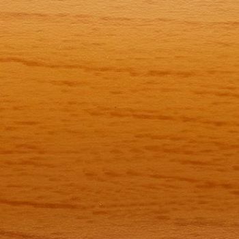 Varnished oak-like panel with horizontal grain and fine darker streaks; showing a smooth, slightly reflective surface; evenly lit warm amber tone, resembling a tabletop or cabinet face.